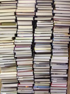 Image of a tall stack of books