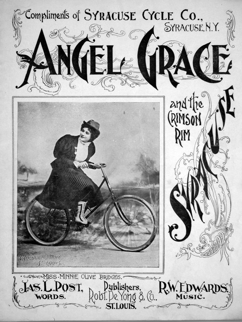 sheet music cover with woman riding a bike